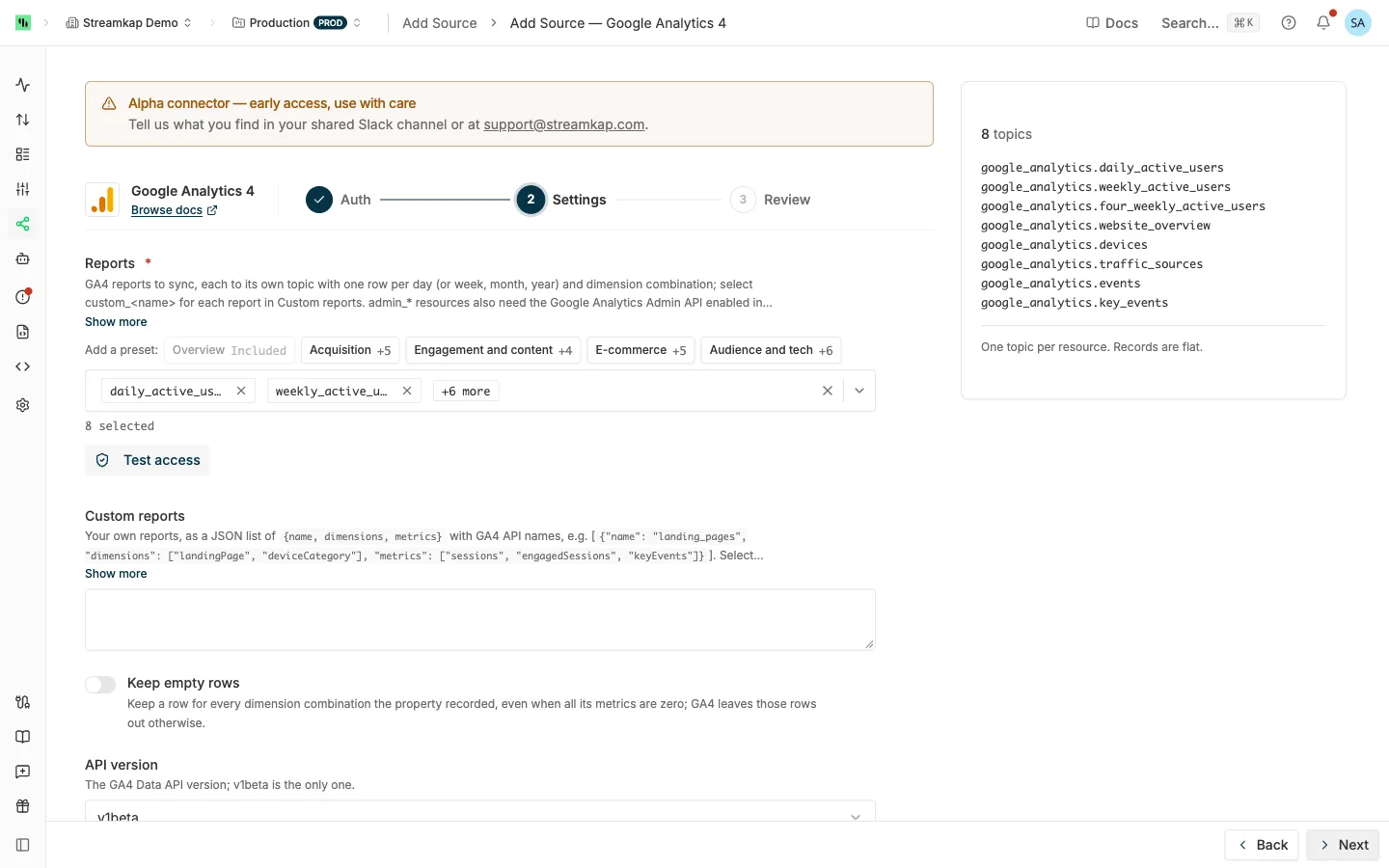 Google Analytics 4 source Settings step with the report presets, the Reports list, Custom reports, Keep empty rows and API version